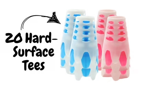 Little Links kids golf hard surface tees 20 pack in blue and pink colors, designed for use on firm surfaces to help young golfers practice safely and improve their swing without needing grass.