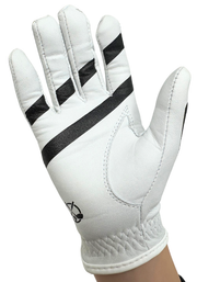 Little Links kids golf training glove for right hand in white shown in a palm view on a child’s hand, highlighting grip alignment lines, palm padding, and flexible material designed to help young golfers develop proper hand positioning and build confidence while practicing their swing.