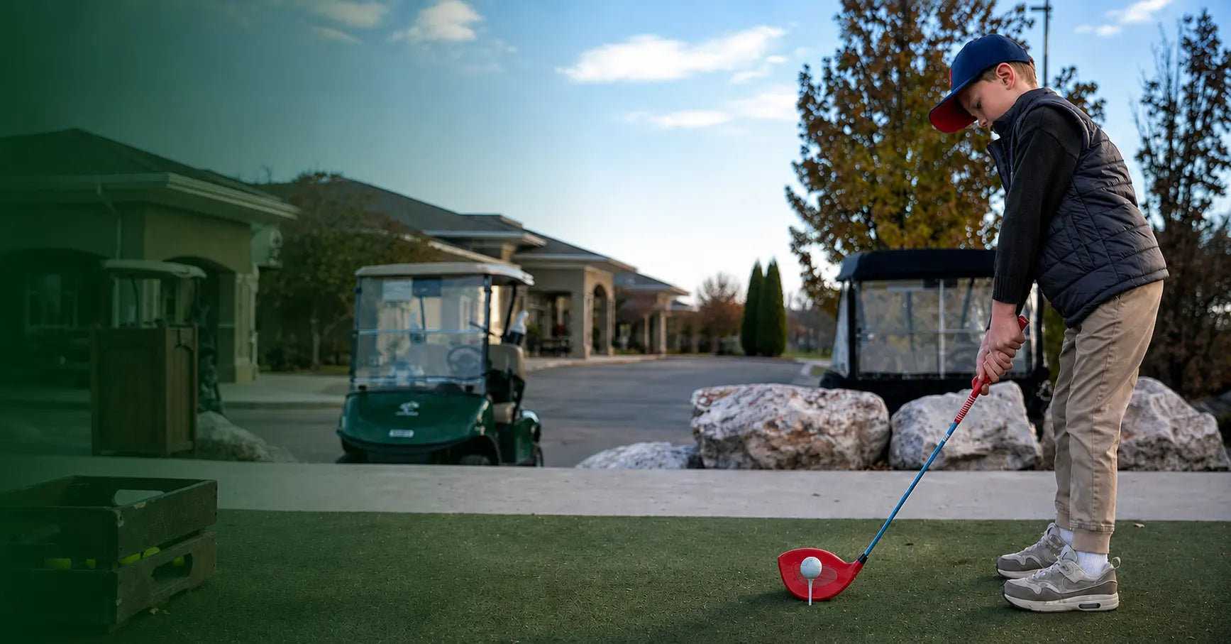 Young golfer practising with a Little Links club